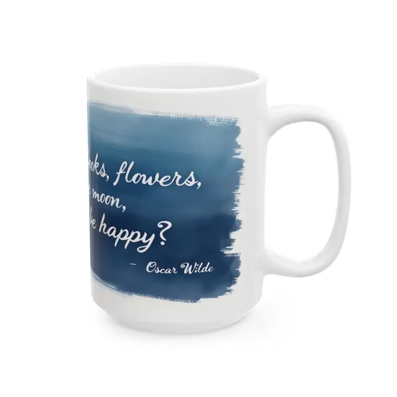 The Inspirational Ceramic Mug features a blue design and the Oscar Wilde quote “With freedom, books, flowers, and the moon, who could not be happy?”—perfect for book lovers, coffee enthusiasts, or as unique home decor.
